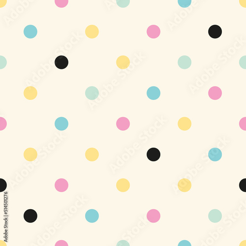 Colorful pastel dots over cream background
