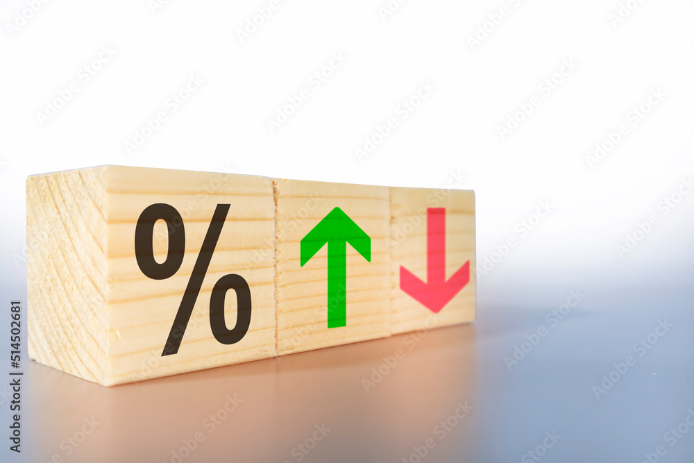 Fototapeta premium The percentage interest rate goes up or down on a light gray background.