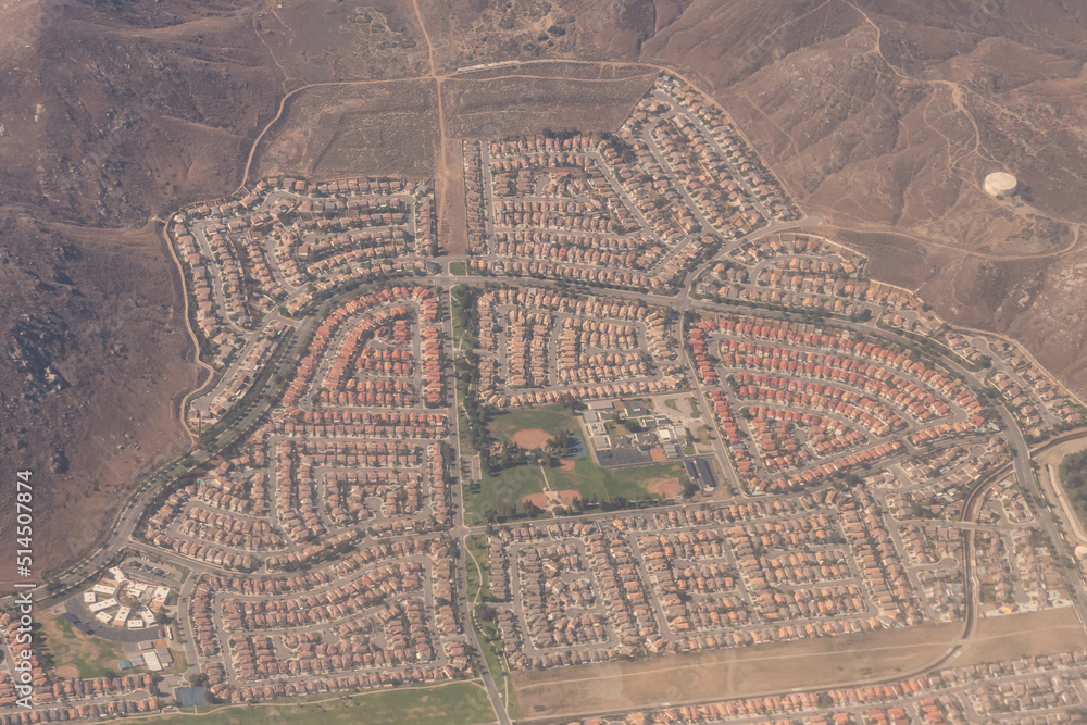 Aerial view of Southern California community in the desert near the mountains