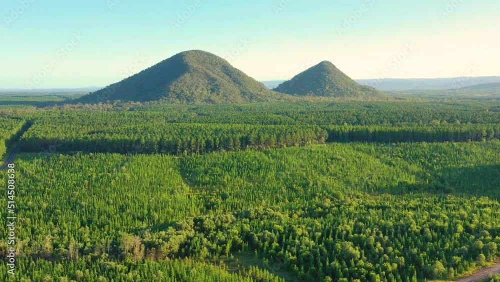 Aerial view of Mt Beerwah and Mt Coonowrin, Glass House Mountains, Sunshine Coast Hinterland, Queensland, Australia. Aerial view of Mt Beerwah and Mt Coonowrin, Glass House Mountains, Sunshine Coast Hinterland, Queensland, Australia.