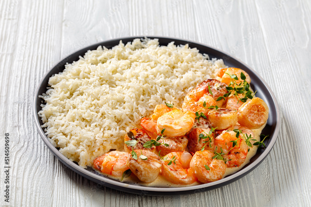 shrimps and scallops with coconut sauce and rice shrimps and scallops with coconut sauce and rice