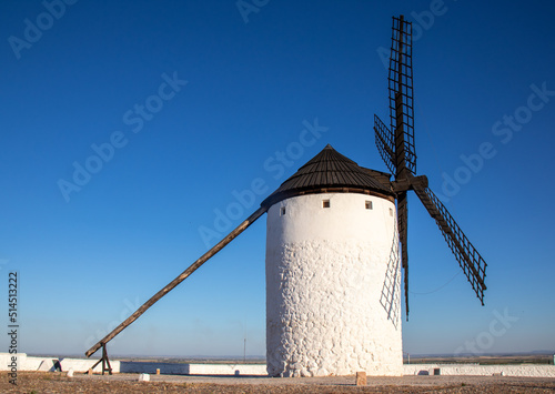 Windmill in Campo de Criptana with blue sky, Spain