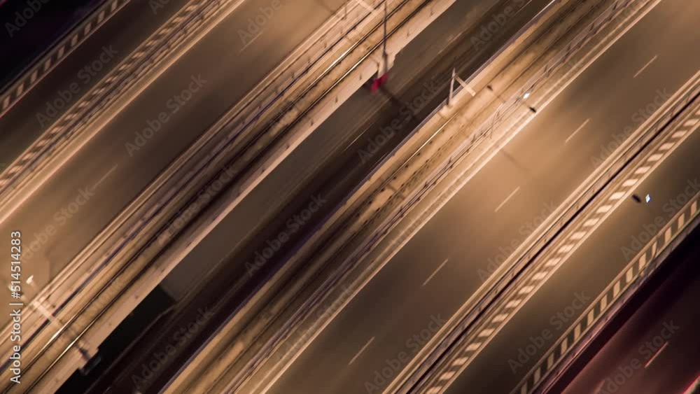 Aerial top down view of an empty bridge illuminated at night Aerial top down view of an empty bridge illuminated at night