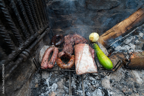 Wallpaper Mural Typical Uruguayan and Argentine Asado Cooked on fire. Entrana and Vacio meat cuts. Accompanied with Chorizo Torontodigital.ca