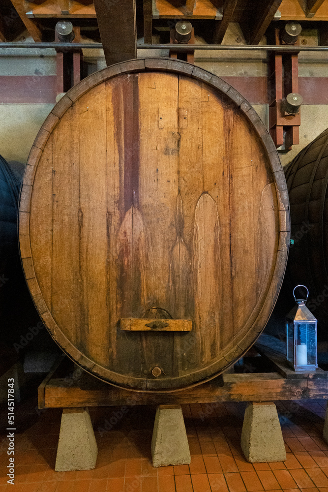 Closeup of wine barrel in a wine cellar in Napa Valley