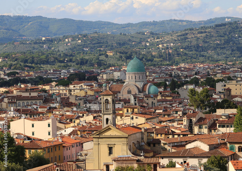 Domes of the synagogue of the city of Florence in the region of Tuscany and also the bell tower of a catholic church
