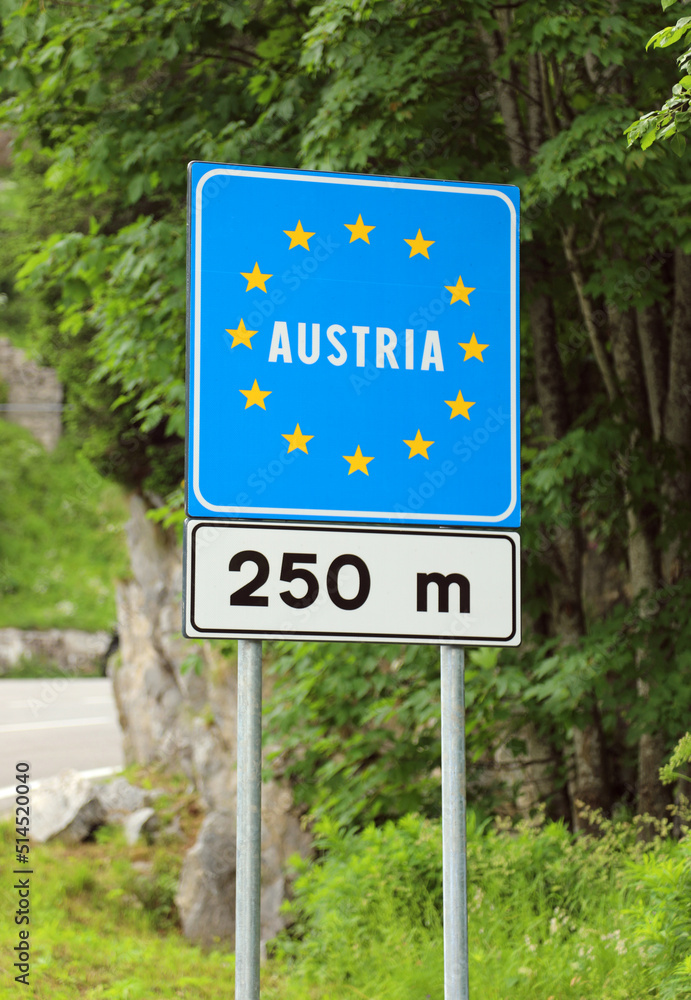 sign with the writing Austria in Italian on the border which is 250 meters between the Austrian Republic and Italy in Europe