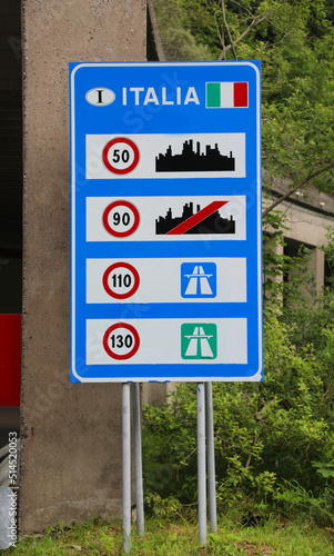 road sign on the border with Italy with the indications of the speed limits in the city on the extra-urban roads and on motorway photo