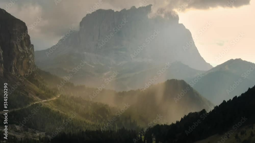 Aerial sunset view of Gardena pass mountain road, Passo Gardena, Rifugio Frara, Dolomiti, Dolomites, South Tyrol, Italy Aerial sunset view of Gardena pass mountain road, Passo Gardena, Rifugio Frara, Dolomiti, Dolomites, South Tyrol, Italy