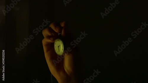 pocket watch in glowlight  photo