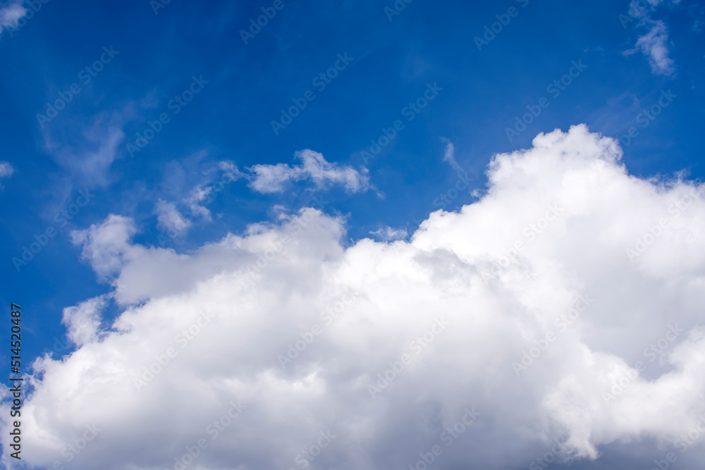 a dark cloud covers the blue sky. before the storm and thunder a dark cloud covers the blue sky. before the storm and thunder