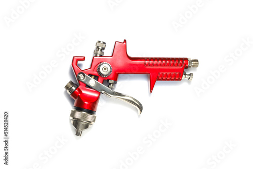 industrial red airbrush on a white background close-up. paint spray tool. isolated on white background
