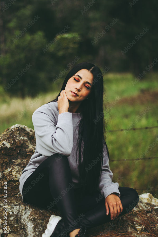 portrait of young woman with long black hair portrait of young woman with long black hair