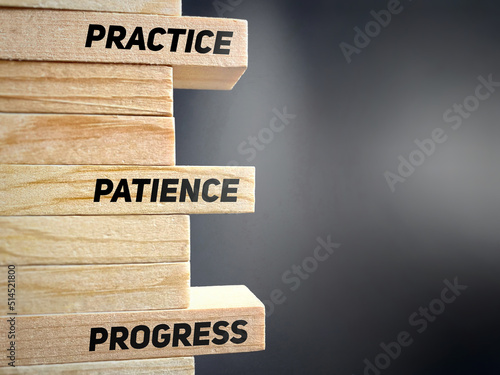 Inspirational Quote - practice patience progress text on wooden blocks background. Stock photo.  photo