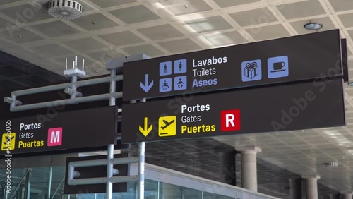 Gates sign in airport. Spanish symbols. photo
