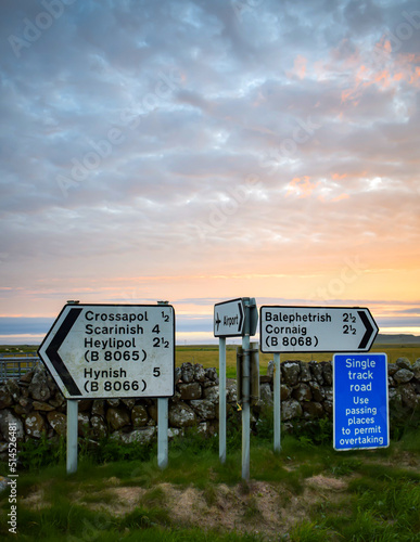 Gaelic place names on a road sign near Crossapol on the Isle of Tiree, Inner Hebrides, Scotland photo