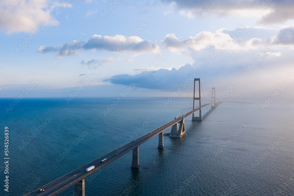 Aerial view on the famous Great Belt bridge (Østbroen) in Denmark, a multi-element fixed link crossing the Great Belt strait between the Danish islands of Zealand and Funen Aerial view on the famous Great Belt bridge (Østbroen) in Denmark, a multi-element fixed link crossing the Great Belt strait between the Danish islands of Zealand and Funen