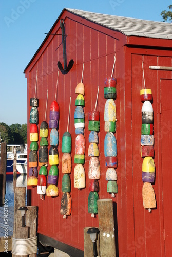 Red Boat House with Buoys