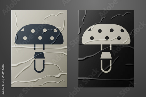 White Amanita muscaria or fly agaric hallucinogenic toadstool mushroom icon isolated on crumpled paper background. Spotted poisonous mushroom. Paper art style. Vector