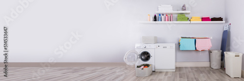 Bild auf Leinwand Basket Full Of Dirty Clothes In Laundry Room