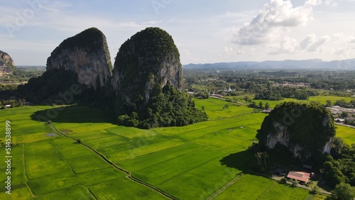 The Limestone Keteri Hill and The Surrounding Rice Paddy Fields photo