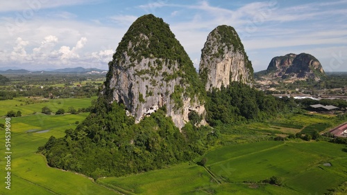 The Limestone Keteri Hill and The Surrounding Rice Paddy Fields photo