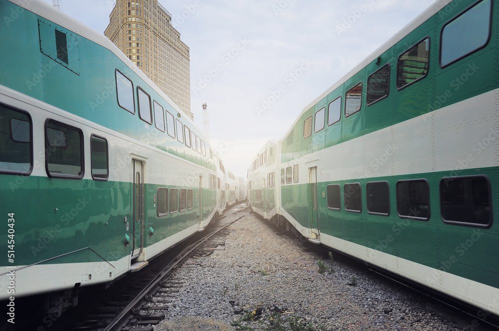 Passenger local trains move at Toronto Union station. Passenger local trains move at Toronto Union station.