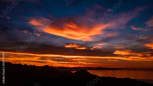 Red sunset over the clouds © Chemseddine