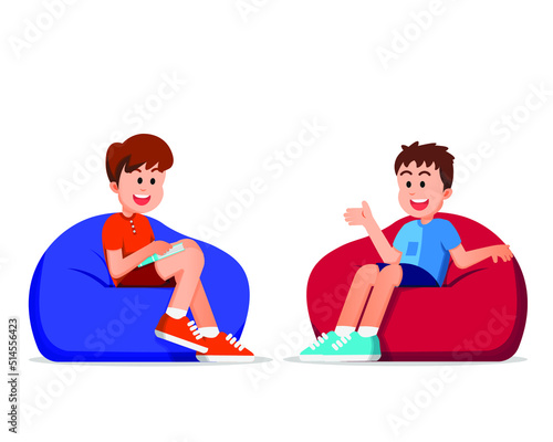 boys discussing together while sitting on beanbags