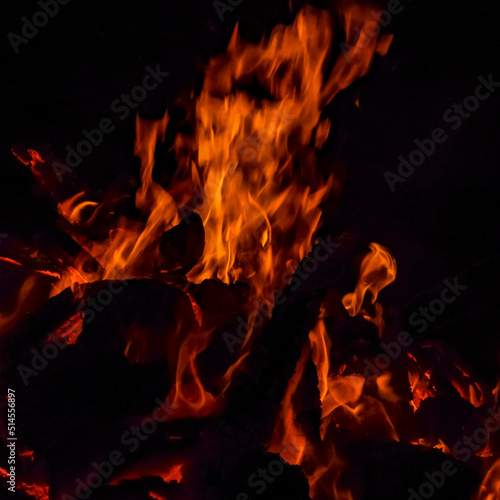 Fire flames on black background  Blaze fire flame texture background  Beautifully  the fire is burning  Fire flames with wood and cow dung bonfire