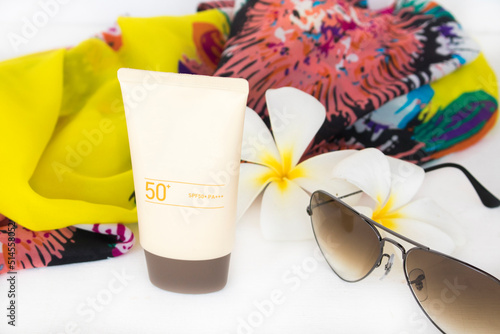 sunscreen spf50 with accessories of lifestyle woman relax summer arrangement flat lay style on background white 