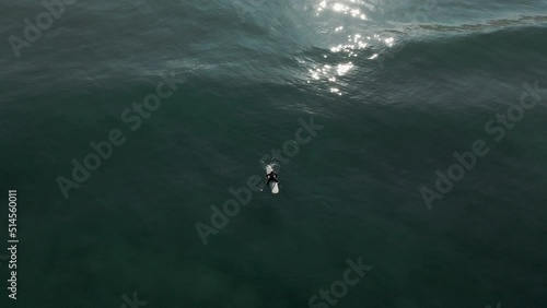  Surfer waiting for a good wave moment for a surf