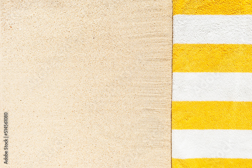 Quadro em tela Top view of sandy beach with stripy yellow and white  beach towel  Summer holida