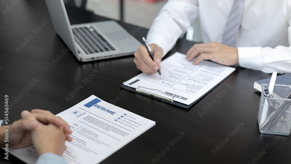 Employer or HR department is reading the resume and interviewing the ability of new employees, job interview with applicants, Using psychology in job interviews, Employment and Recruitment Concept. Employer or HR department is reading the resume and interviewing the ability of new employees, job interview with applicants, Using psychology in job interviews, Employment and Recruitment Concept.
