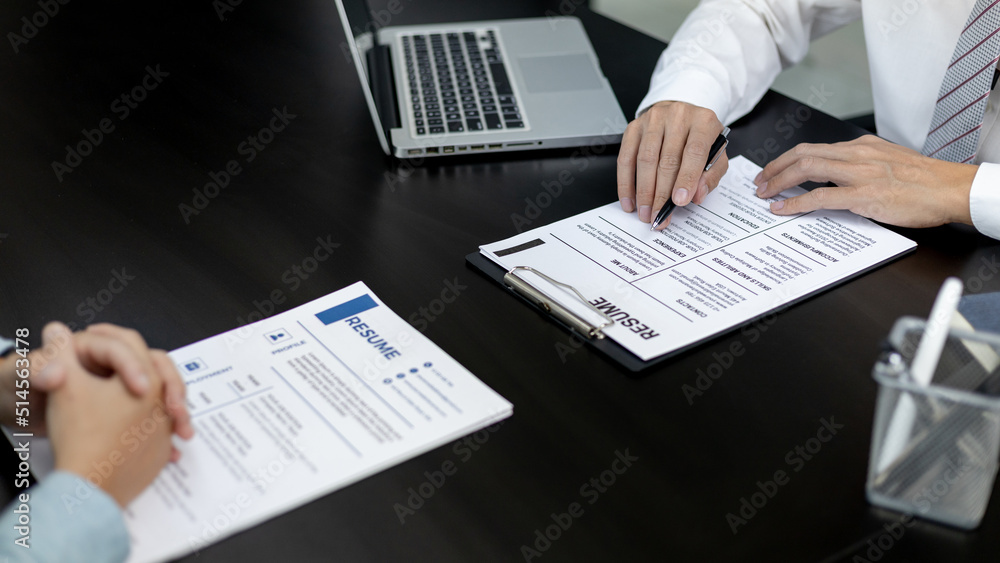 Employer or HR department is reading the resume and interviewing the ability of new employees, job interview with applicants, Using psychology in job interviews, Employment and Recruitment Concept. Employer or HR department is reading the resume and interviewing the ability of new employees, job interview with applicants, Using psychology in job interviews, Employment and Recruitment Concept.