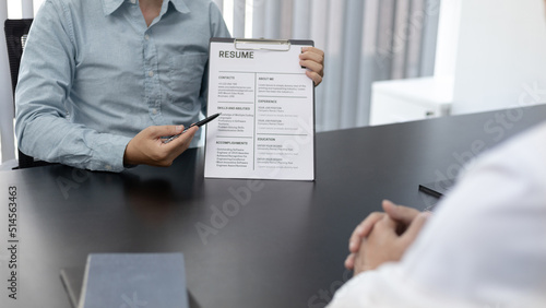 Employer or HR department is reading the resume and interviewing the ability of new employees, job interview with applicants, Using psychology in job interviews, Employment and Recruitment Concept.