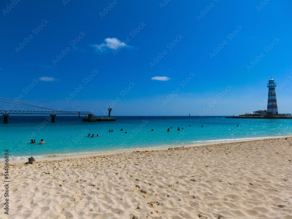Fototapeta premium People resting at beach on Ocean Cay island