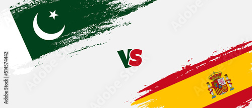 Creative Pakistan vs Spain brush flag illustration. Artistic brush style two country flags relationship background