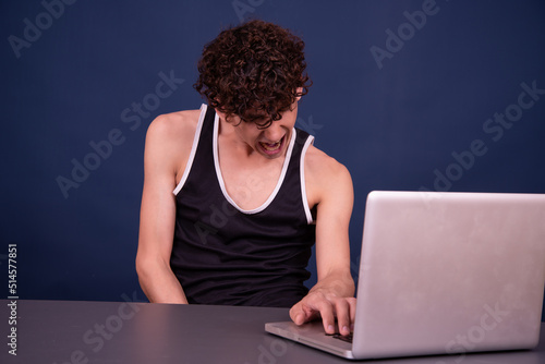 A man watches an adult video online. photo