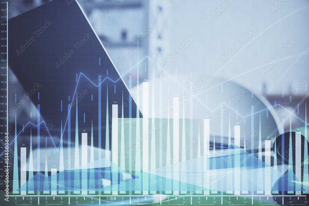 Forex market chart hologram and personal computer background. Double exposure. Concept of investment. Forex market chart hologram and personal computer background. Double exposure. Concept of investment.