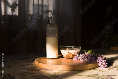 healthy breakfast at home. muesli with yogurt on the table in the morning light. real life. the concept of a healthy breakfast and a good mood. Granola with yogurt and berries for healthy breakfast