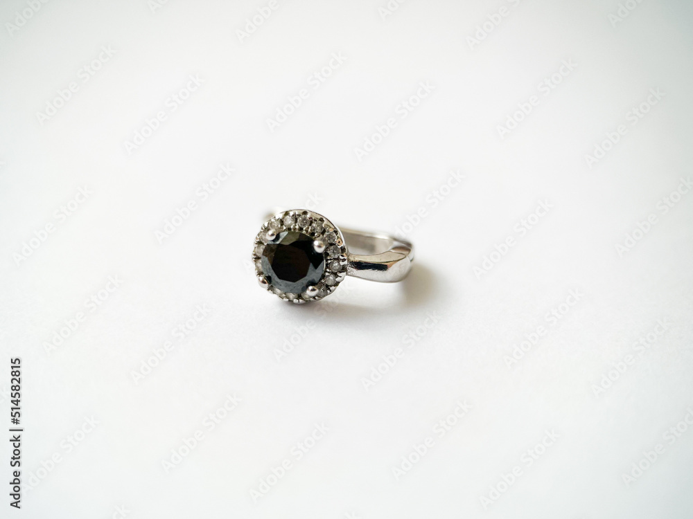 Silver earrings with black zircon close-up Silver earrings with black zircon close-up