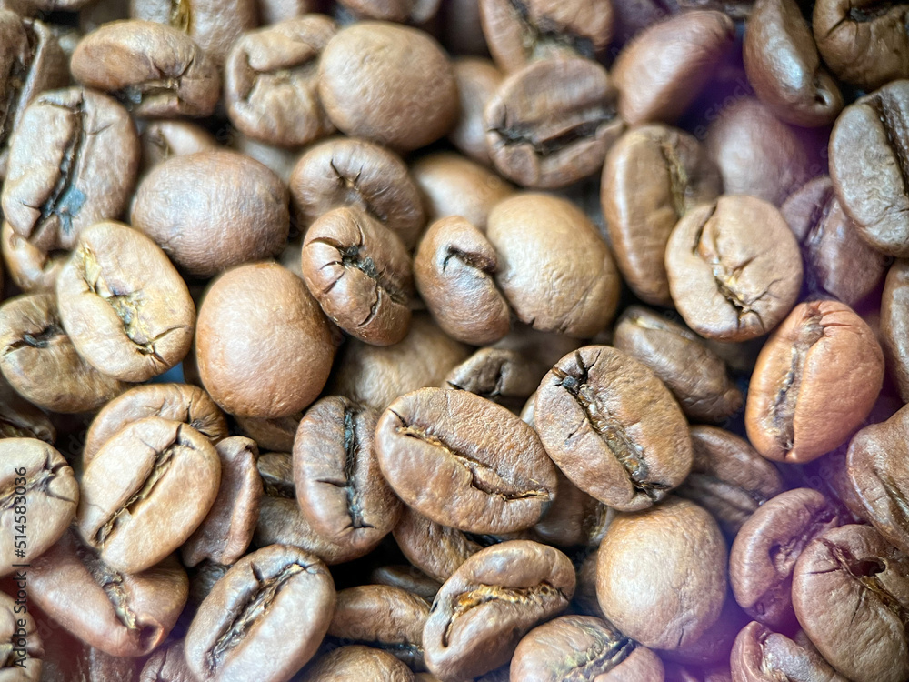 Coffee bean background close-up. Coffee beans in macro. Arabica coffee beans Coffee bean background close-up. Coffee beans in macro. Arabica coffee beans