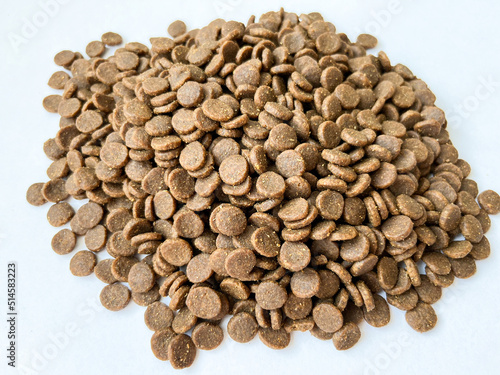 A bunch of holistic dry food for cats and dogs on a white isolated background