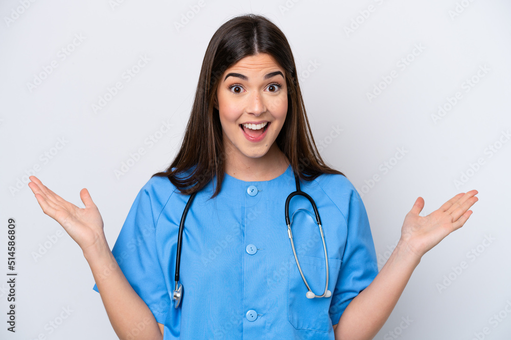 Young Brazilian nurse woman isolated on white background with shocked facial expression Young Brazilian nurse woman isolated on white background with shocked facial expression