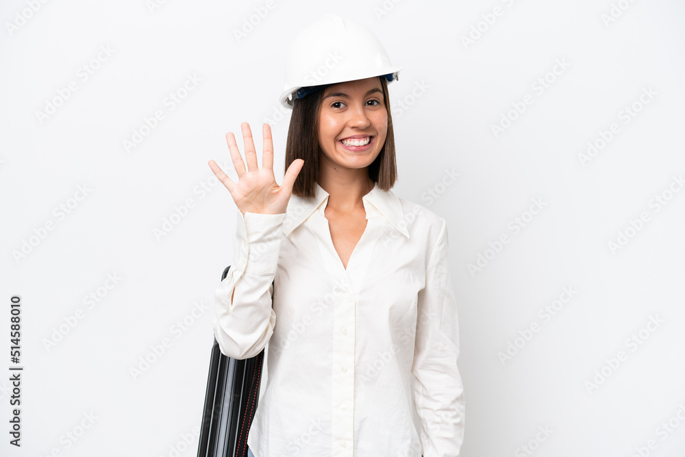 Young architect woman with helmet and holding blueprints isolated on white background counting five with fingers Young architect woman with helmet and holding blueprints isolated on white background counting five with fingers