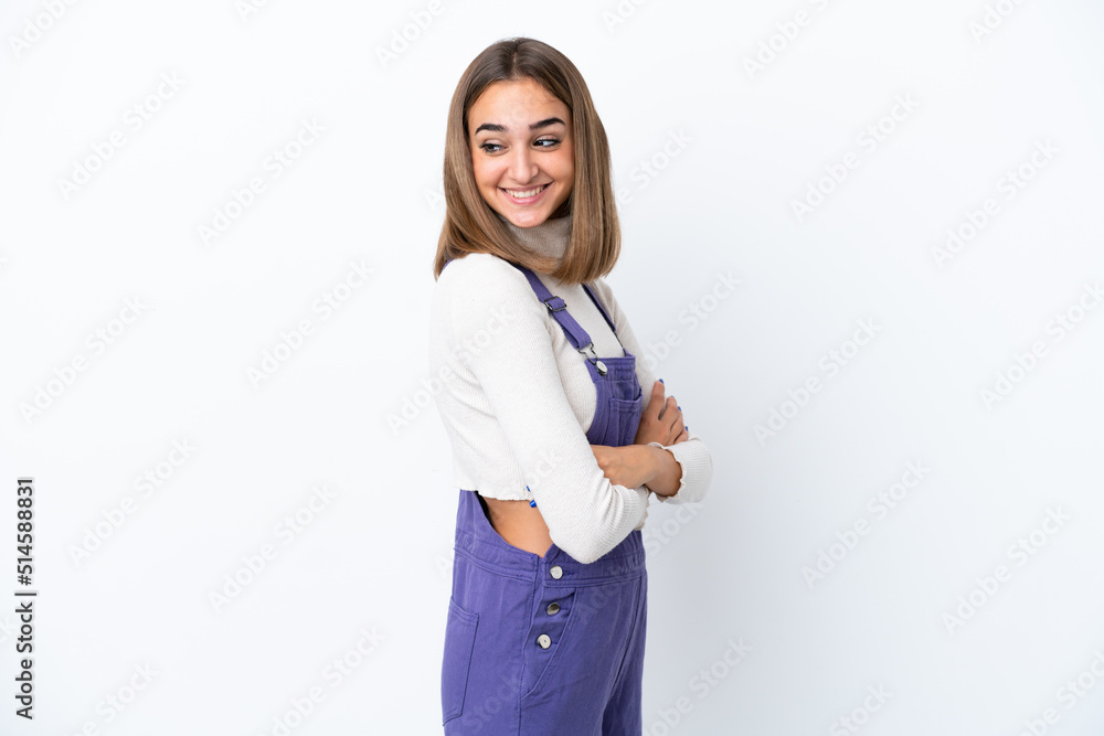 Young caucasian woman isolated on white background with arms crossed and happy Young caucasian woman isolated on white background with arms crossed and happy