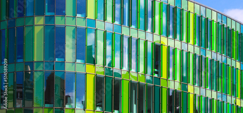 Canvas Print Detail of a green glass building facade in Sweden