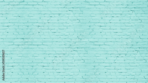 Light teal color old rough brick wall texture. Pastel turquoise aged masonry. Abstract grunge vintage textured background