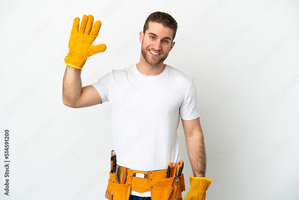 Young electrician man over isolated white wall saluting with hand with happy expression Young electrician man over isolated white wall saluting with hand with happy expression